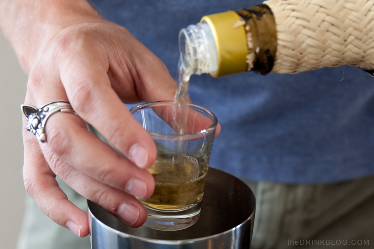 cachaça getting poured for a caipirinha