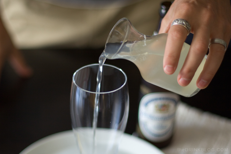 pouring in the lemonade for the radler