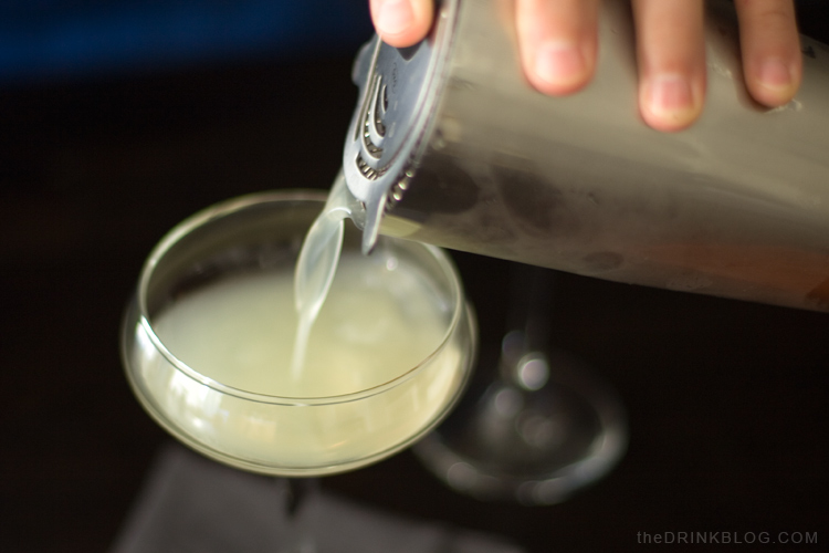 pouring the corpse reviver #2 cocktail