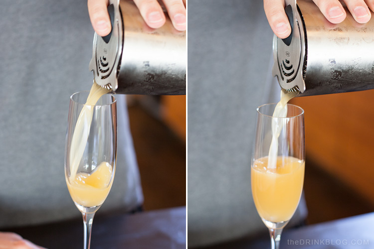 pour cocktail into champagne glass